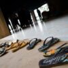Why do people on Guam always take their shoes off before entering a house?